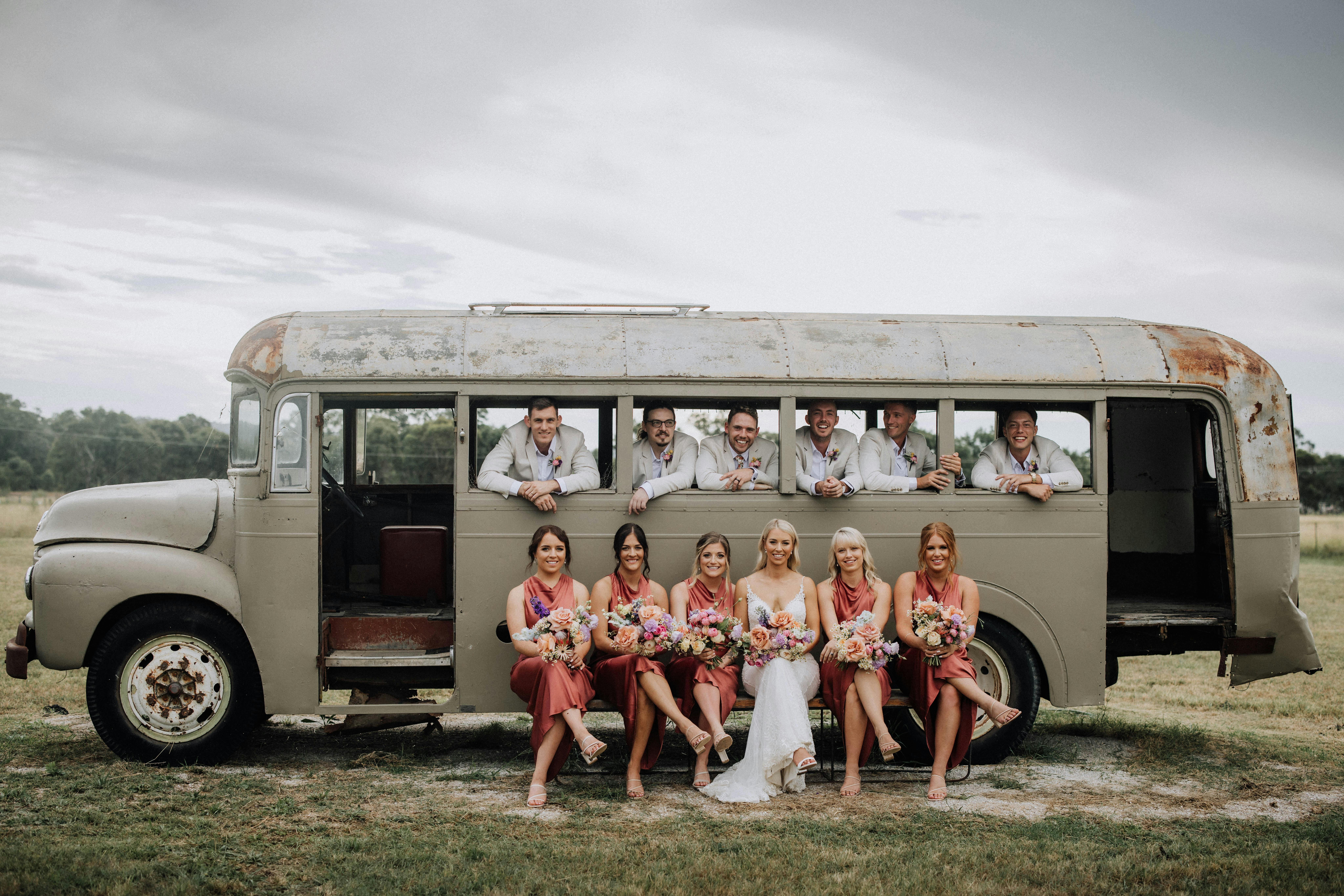The Vinegrove - wedding party in front of vintage bus