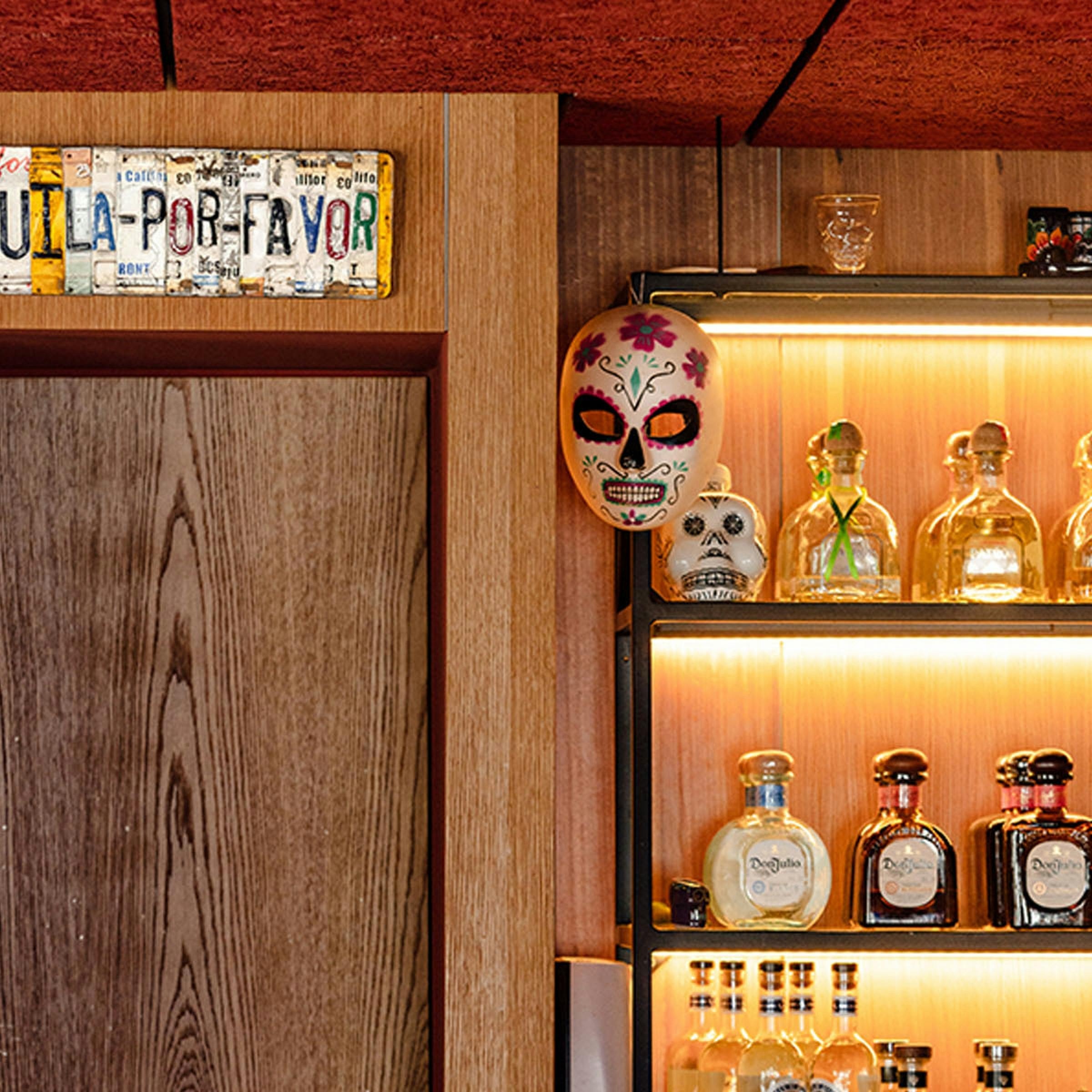 Tequila bottles and Mexican decor at The Mad Mexican restaurant