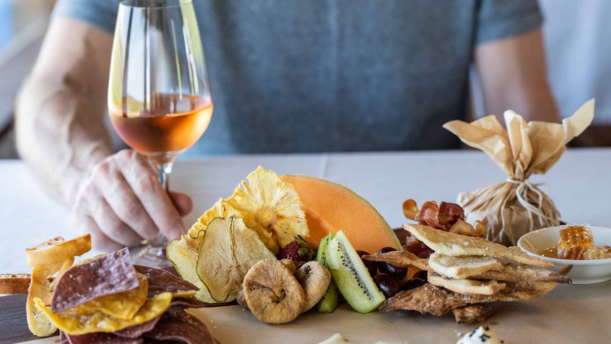 Grazing platter of cheese and wine