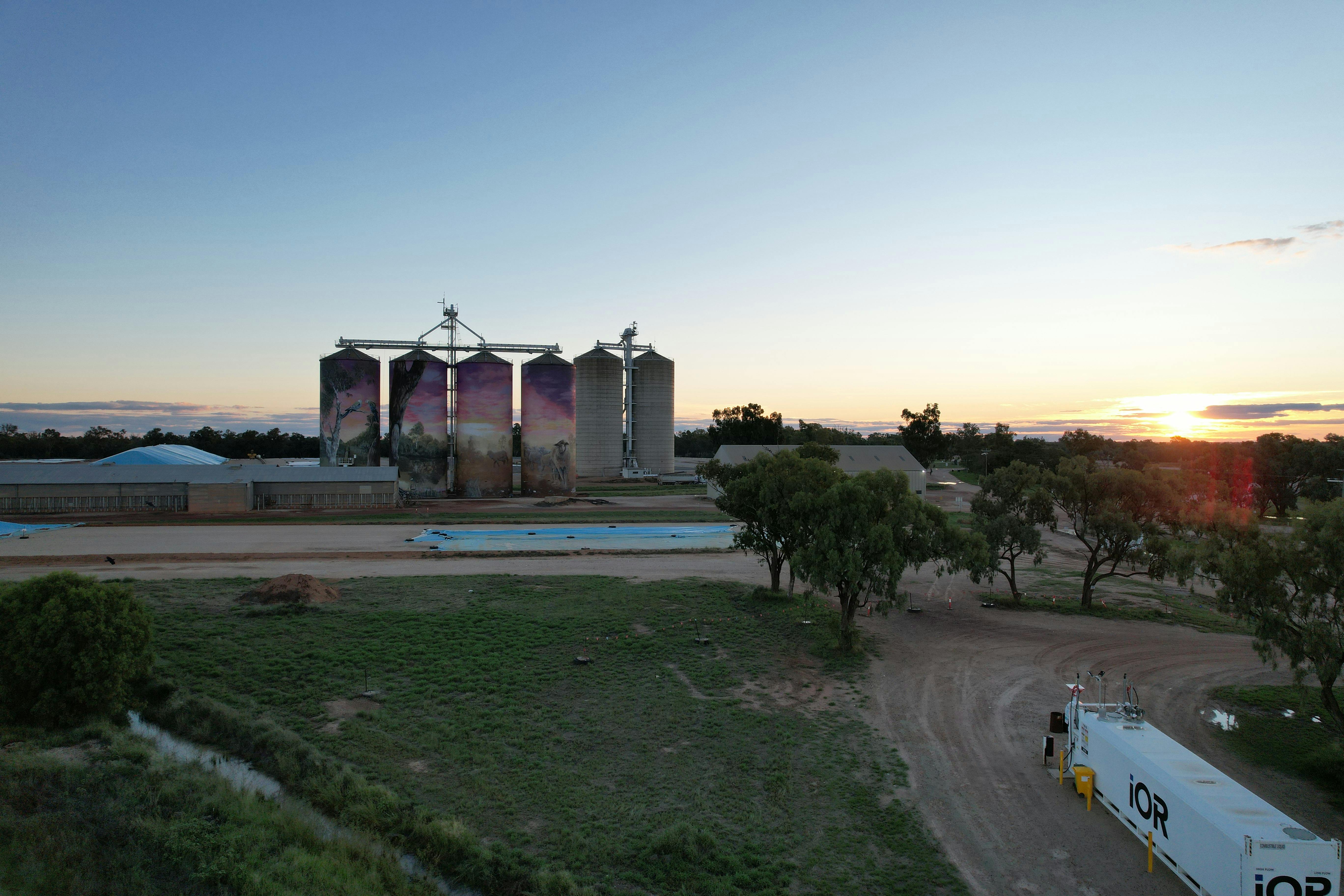 As the sun slowly sets behind the Thallon Silos