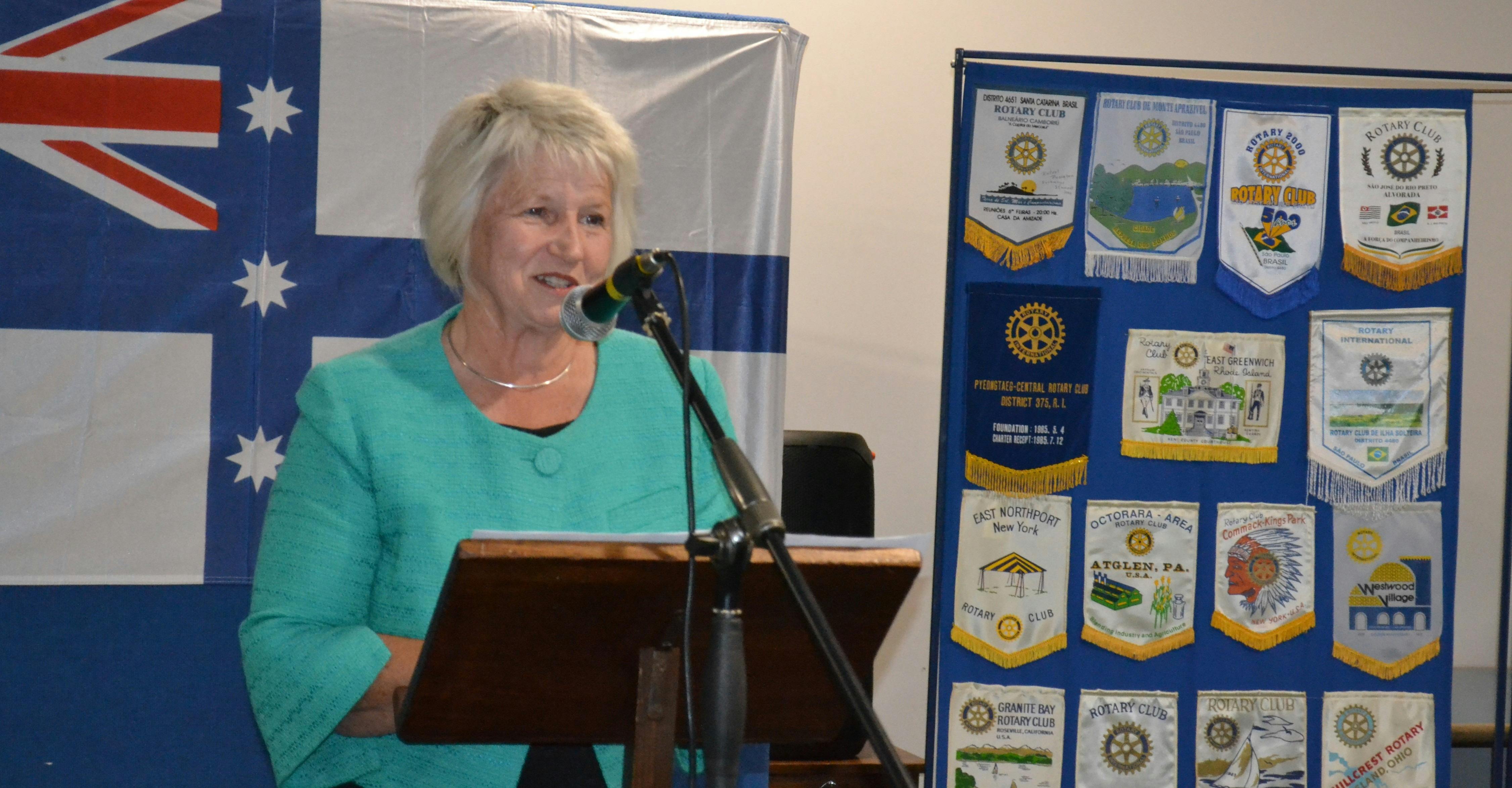 Judy Brewer at lectern speaking