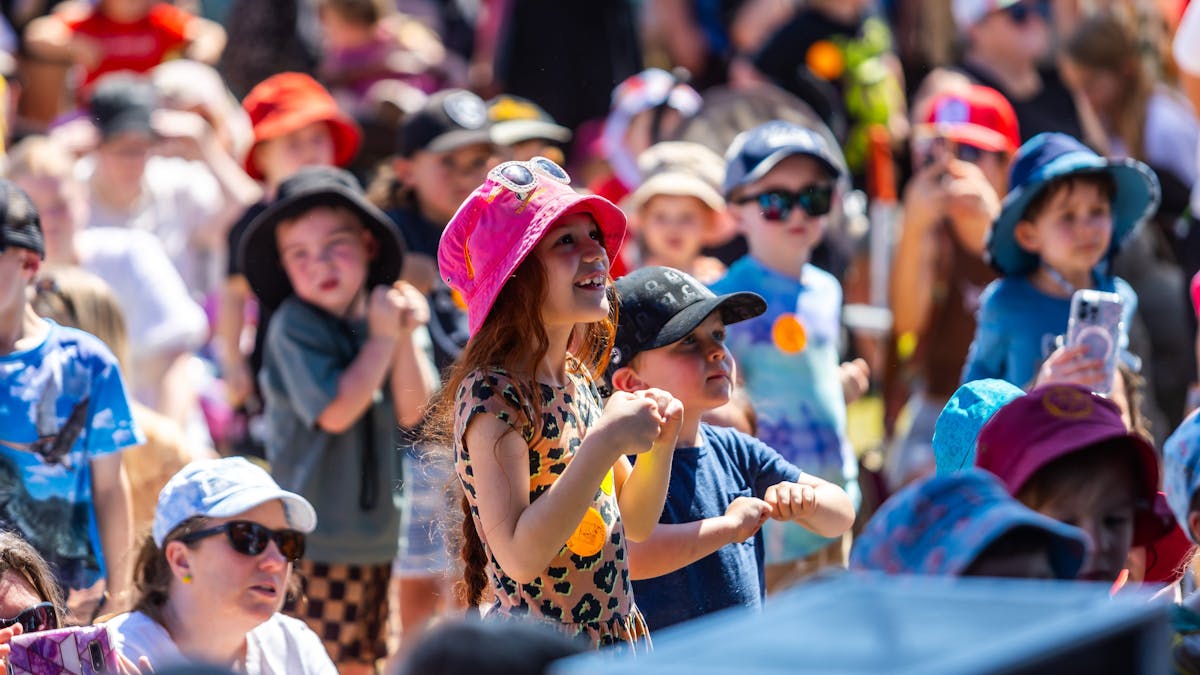 Kids watching stage show