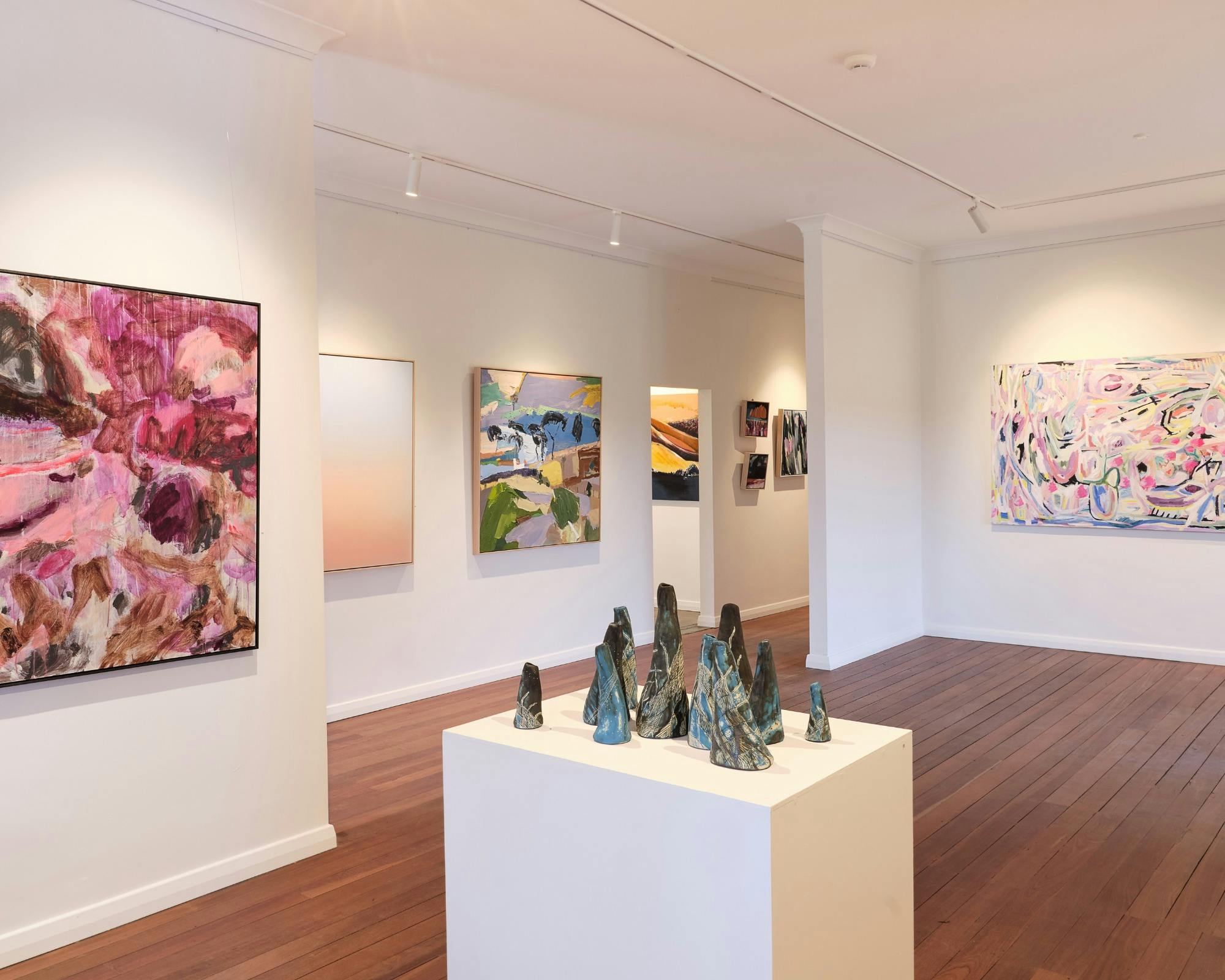Gallery with wall art and stands