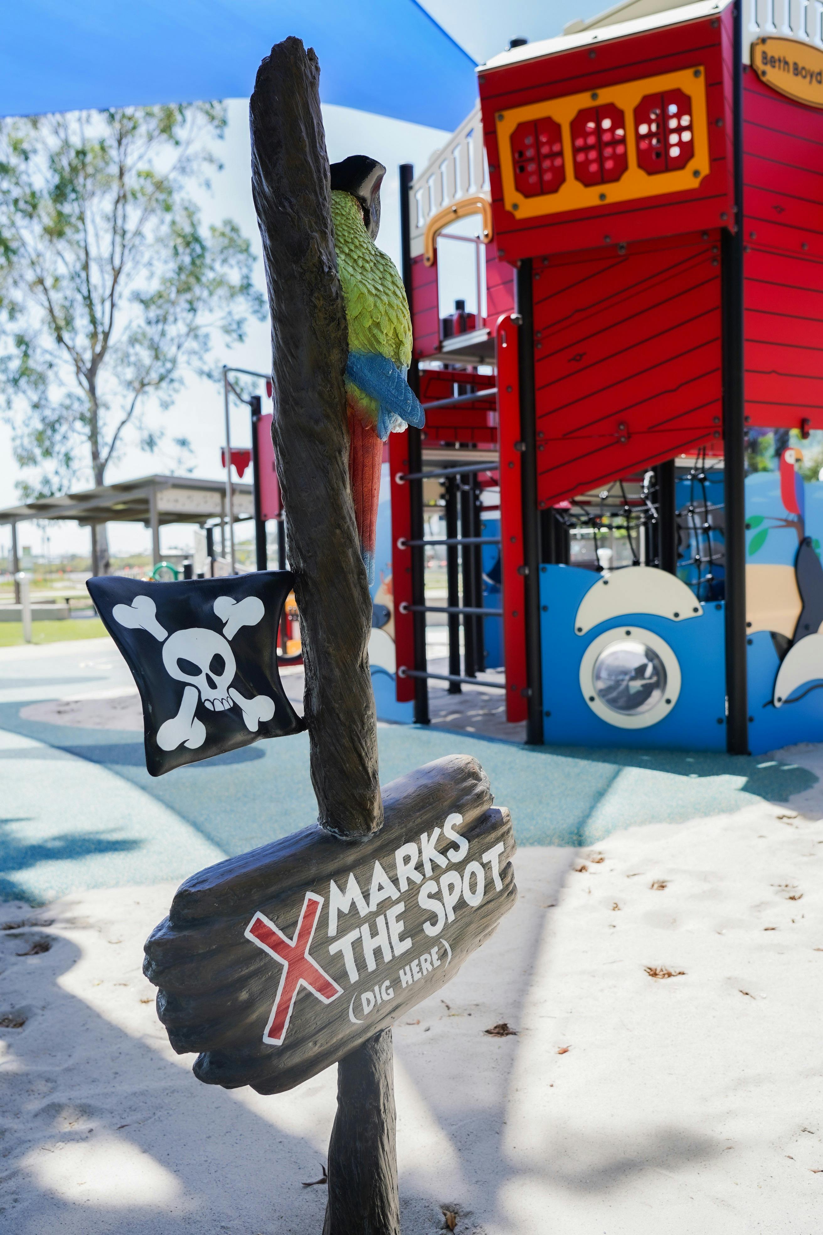 “X Marks the Spot” sign & pirate flag at Beth Boyd Park playground, Thorneside, QLD.