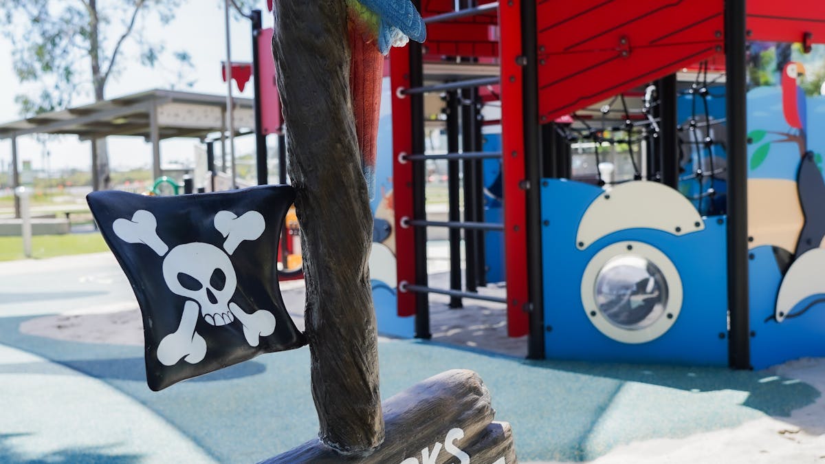 Pirate flag & “X Marks the Spot” sign at Beth Boyd Park playground, Thorneside, Redlands Coast.
