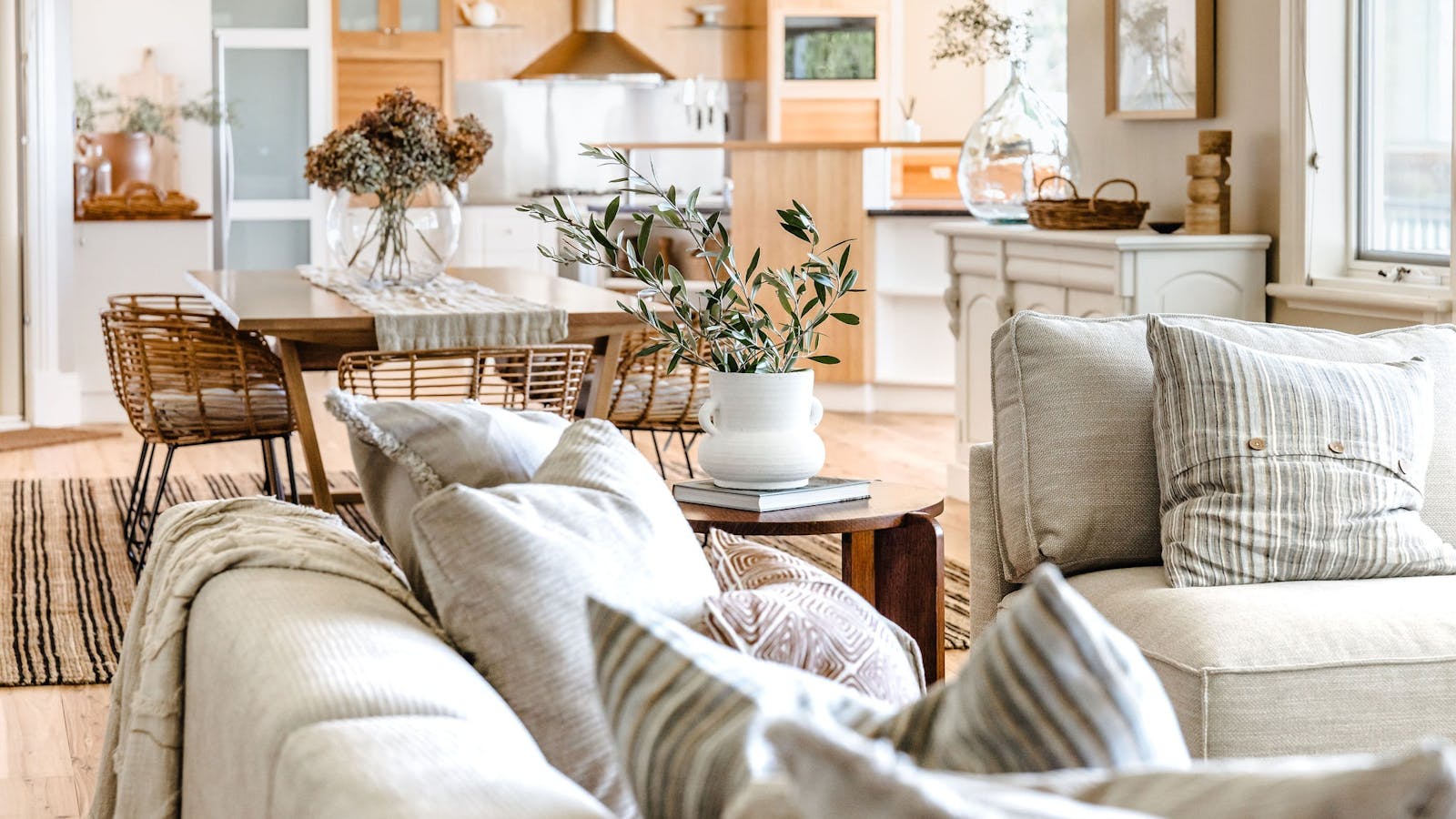 A shot of the second living area with the dining area in the background
