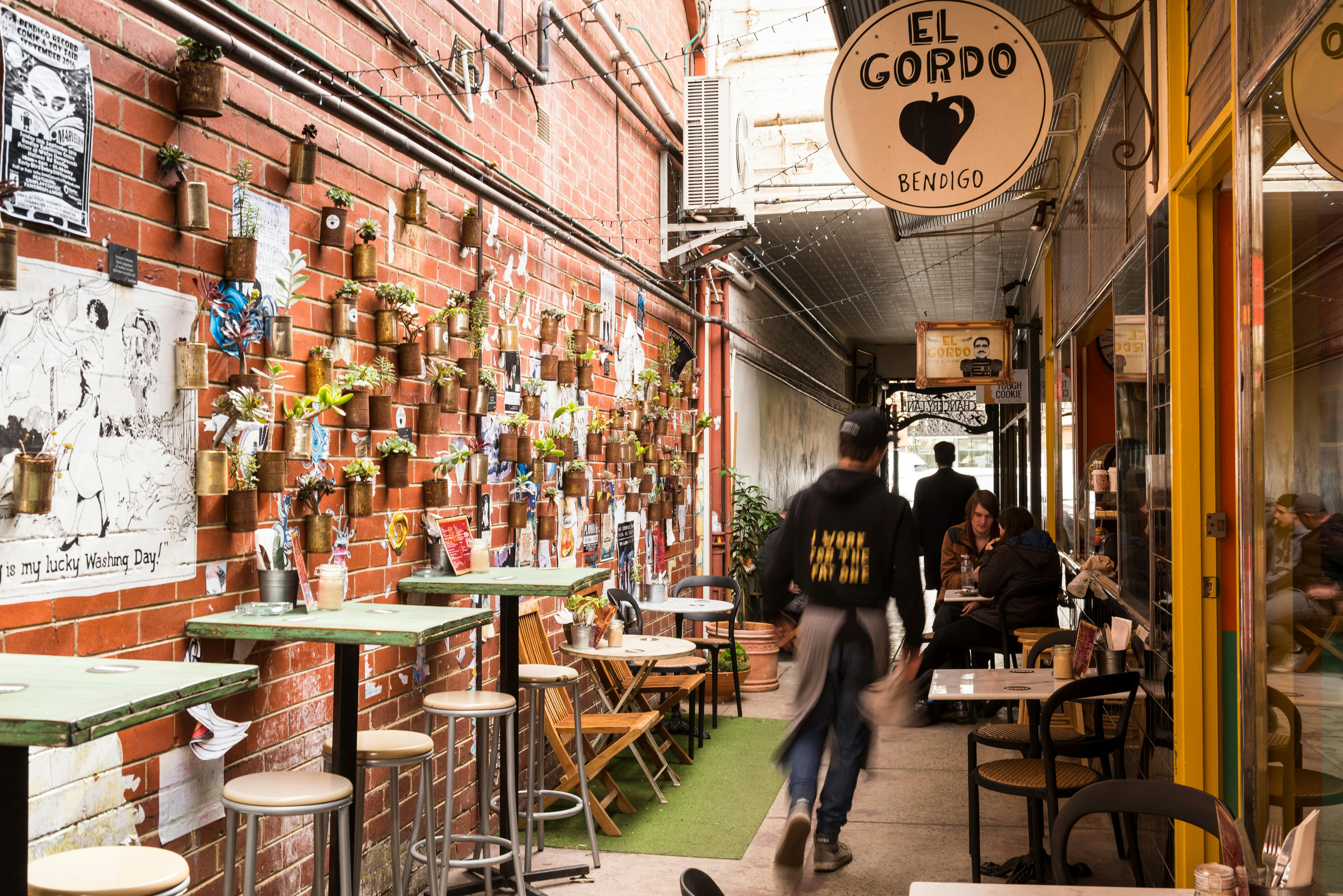 Discover hidden laneways and the local wine and produce