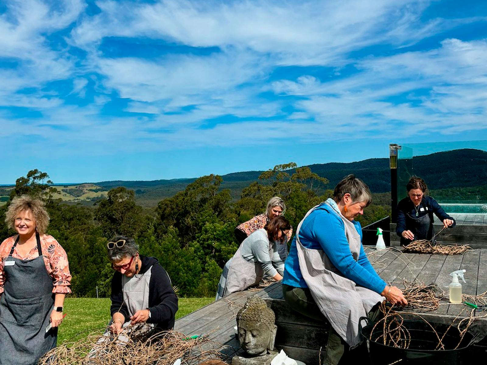 Several people woking on creative pieces