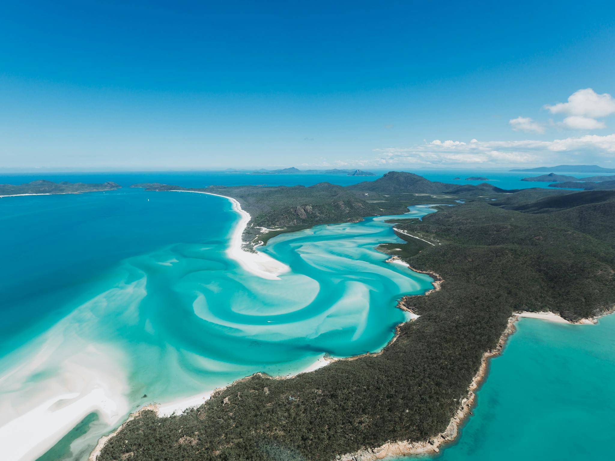 Aerial view of the Whitsunday island with its swirling sands and crystal clear water