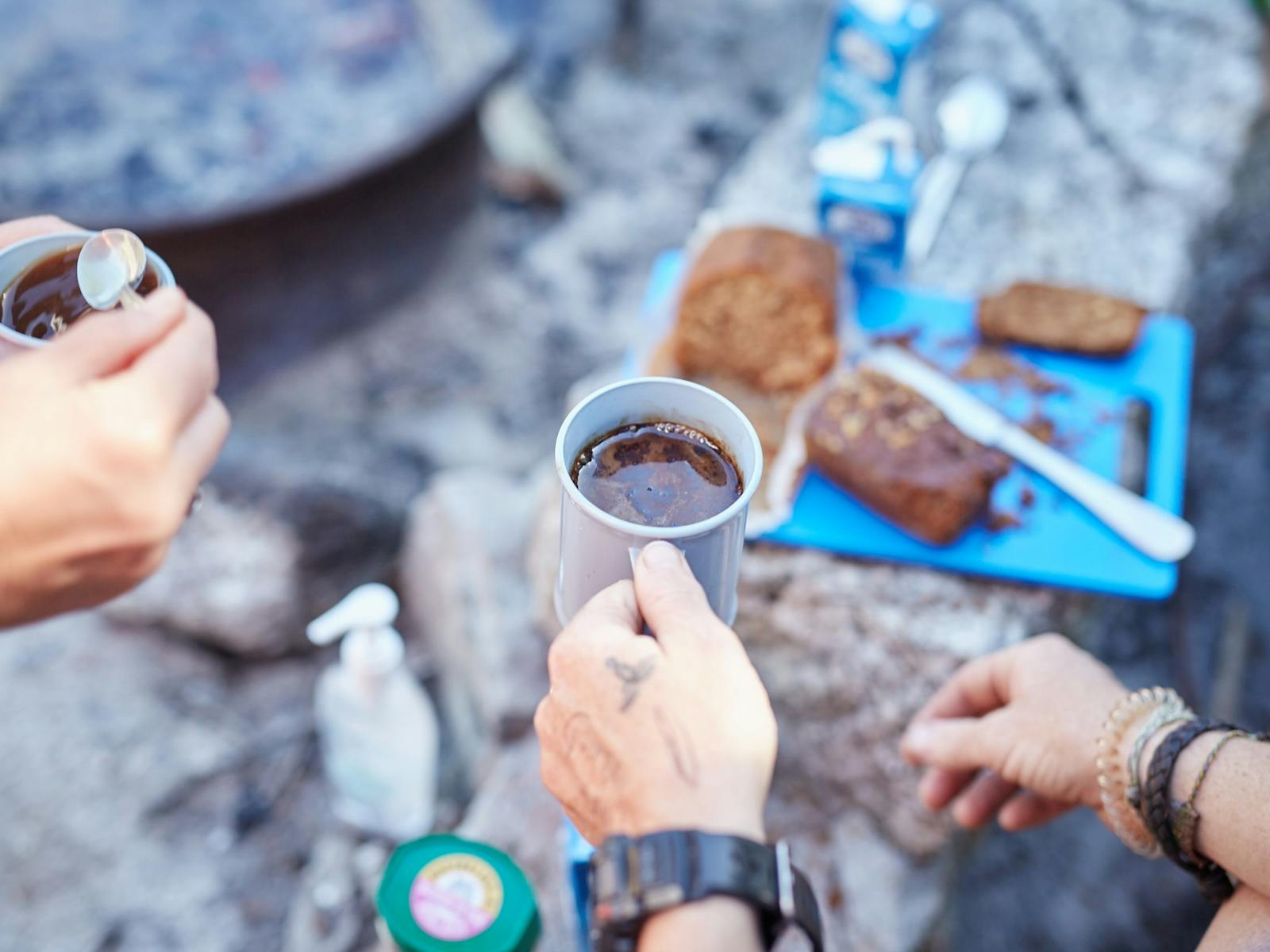 Afternoon Tea Mugs and Cake Hands Granite Rocks Park Trek Walking Holidays Bay of Fires Hiking Tour