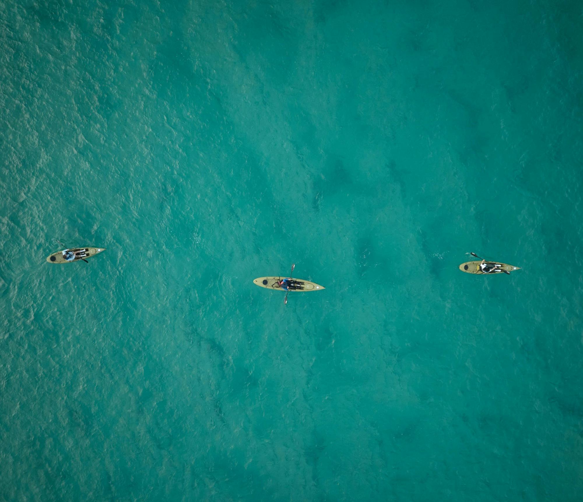 Guests paddle the Pambula River