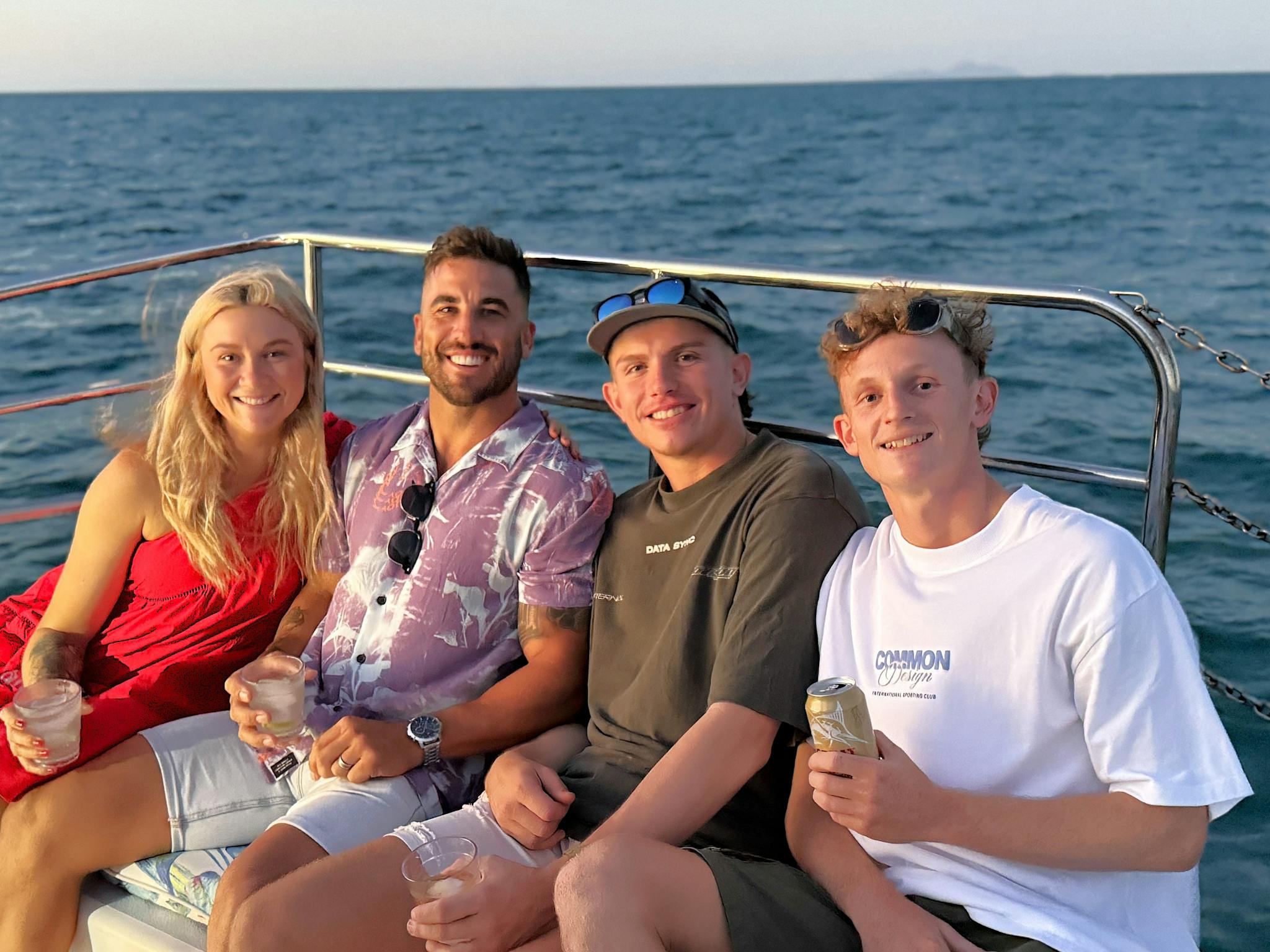 4 guests enjoying the sunset on front deck 4 guests enjoying the sunset on front deck