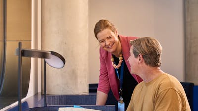 Visitors looking at Collection Items in the Charles Bean Research Centre at the Memorial