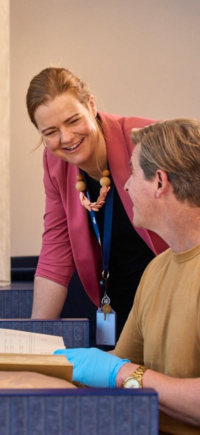 Visitors looking at Collection Items in the Charles Bean Research Centre at the Memorial