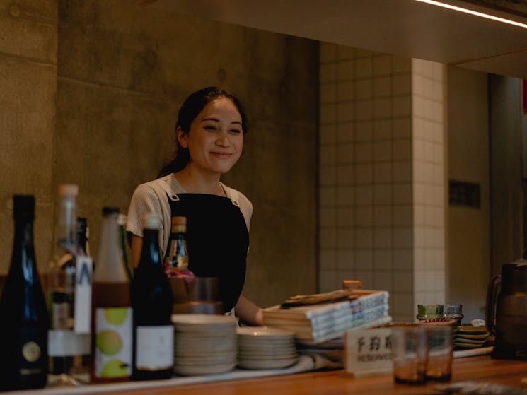 Smiling waiter at Amuro