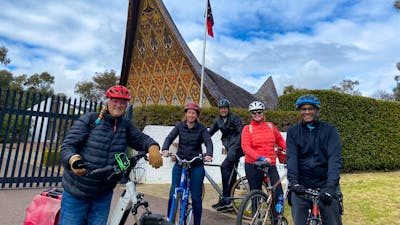 People and bikes outside the Papua New Guinea High Commission, Canberra