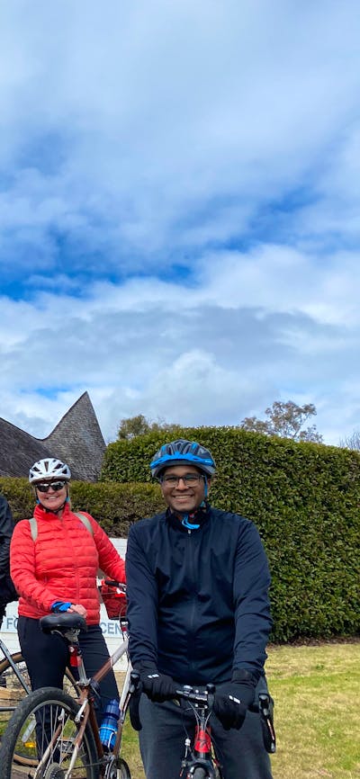 People and bikes outside the Papua New Guinea High Commission, Canberra