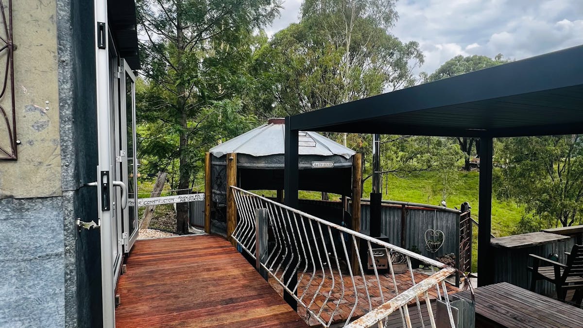 Bathouse, outdoor dining, and Nelly the shepherds Hut