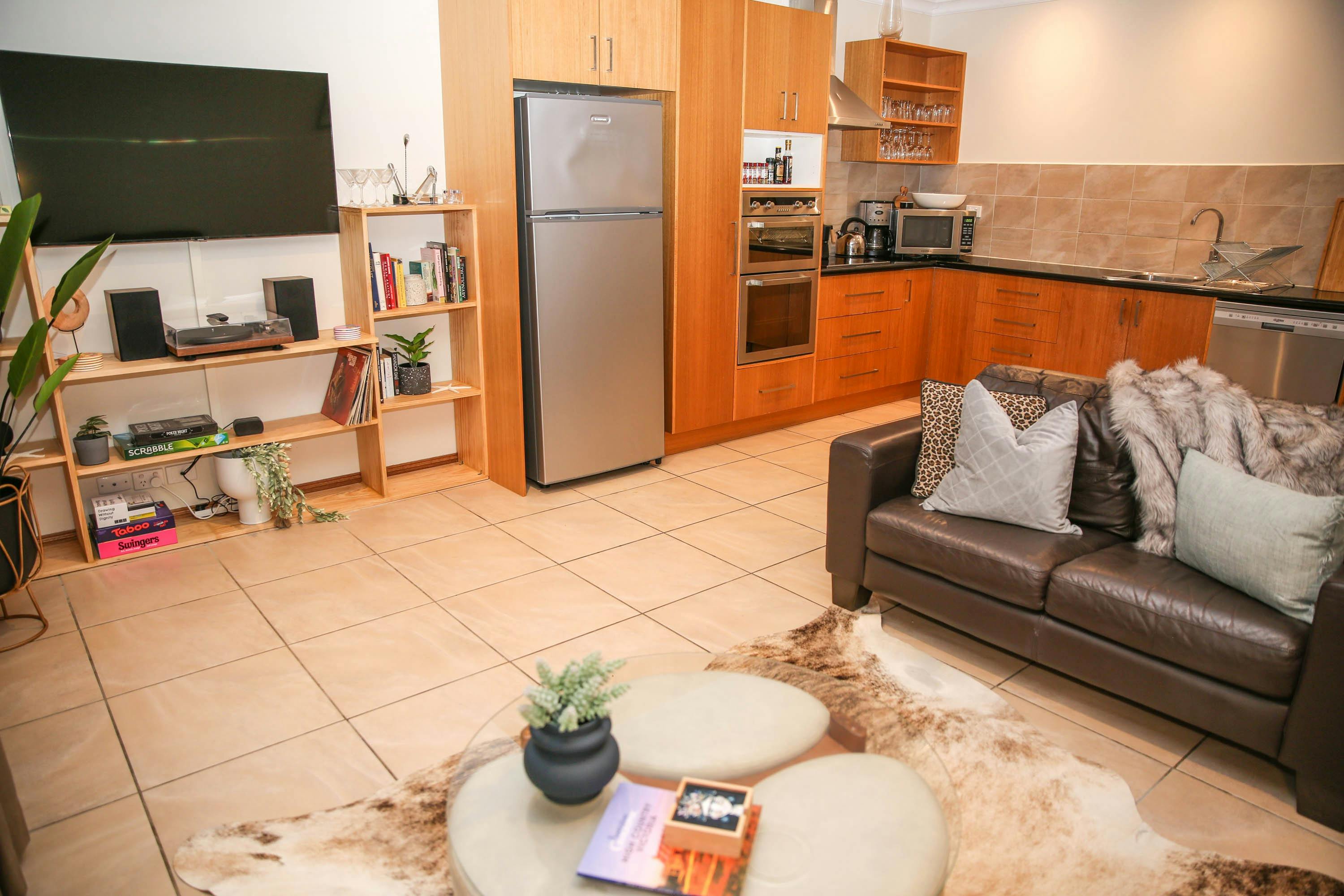 Kitchen & living room at The Outta Towner with Alpine Valley Getaways