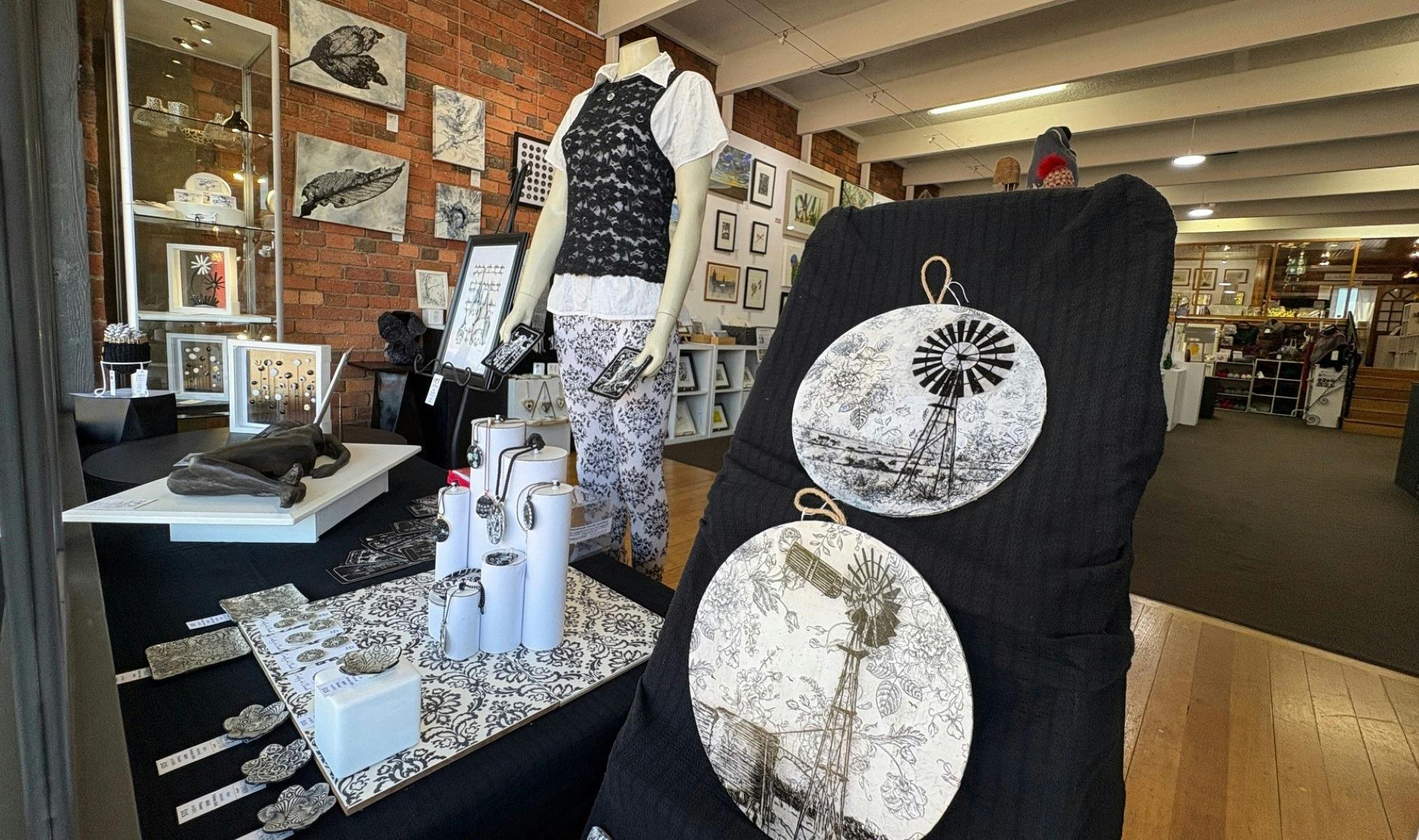 Black and white works grace the front window