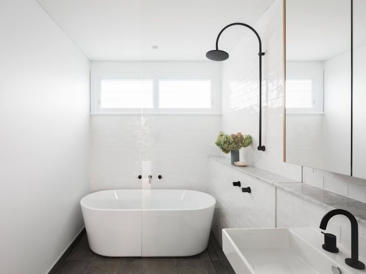 This modern bathroom with bathtub