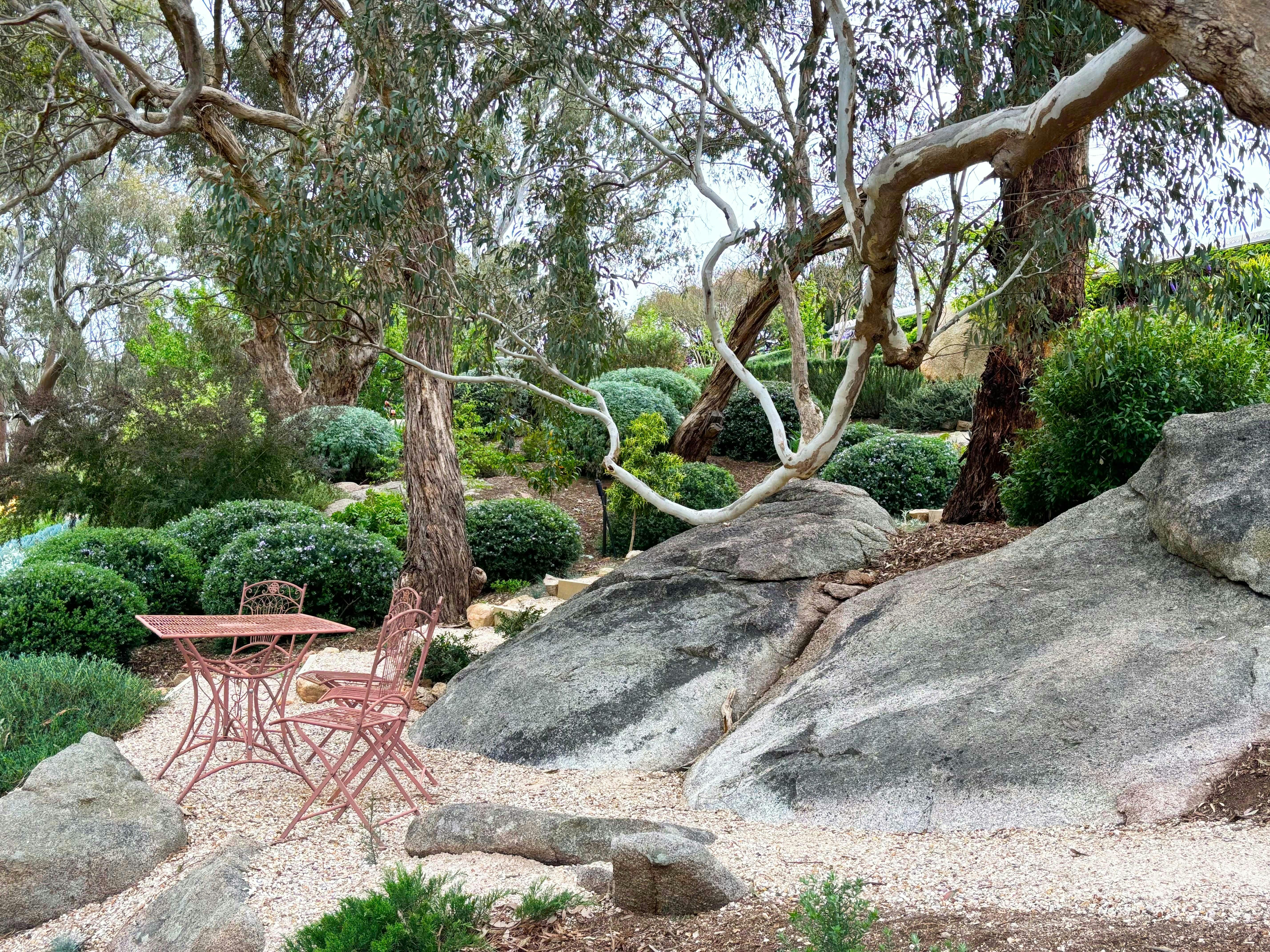 Open Gardens Victoria - Granite Garden - outdoor setting with granite boulder