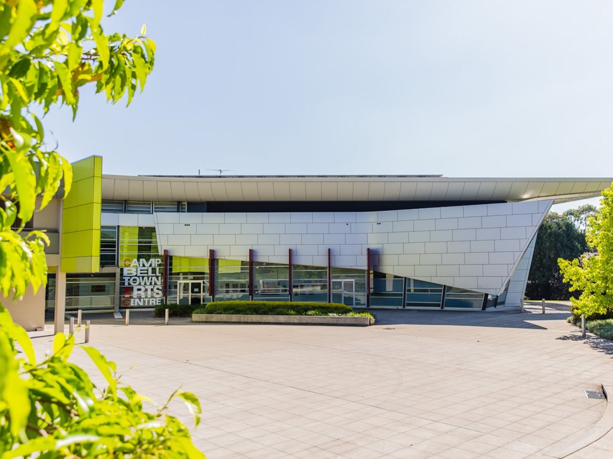 Campbelltown Art Centre's building exterior framed by trees