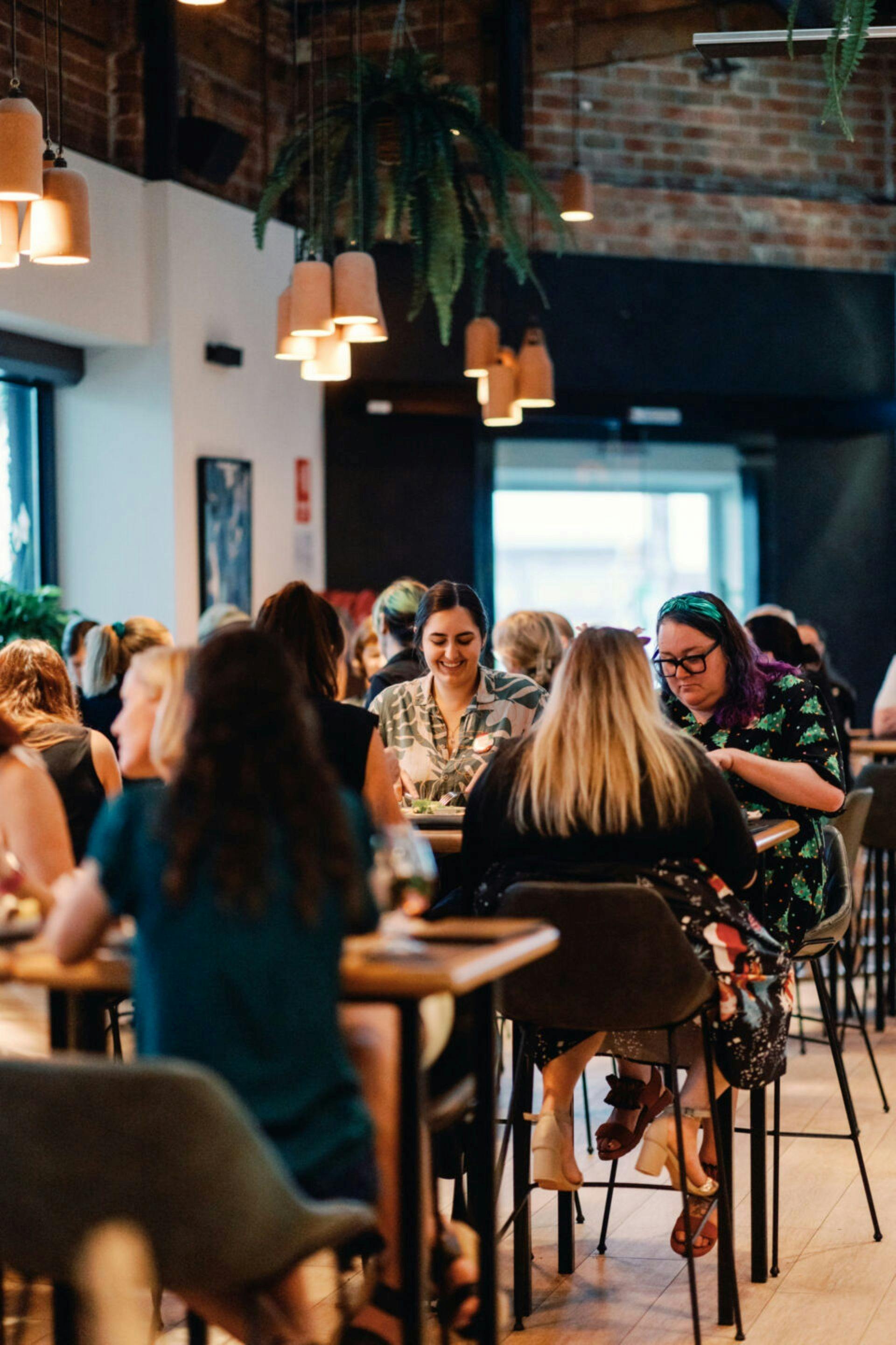 Group of people at a restaurant eating food