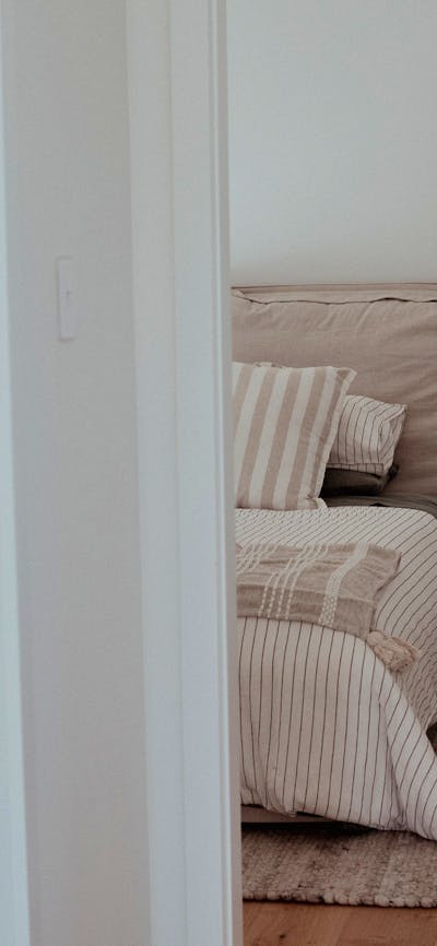 Luxury bedroom down a hall way