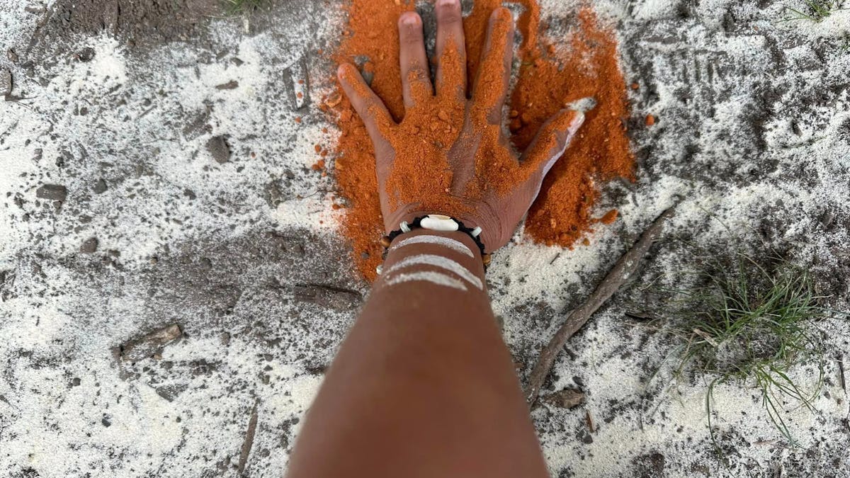coloured sand art with Butchulla tours