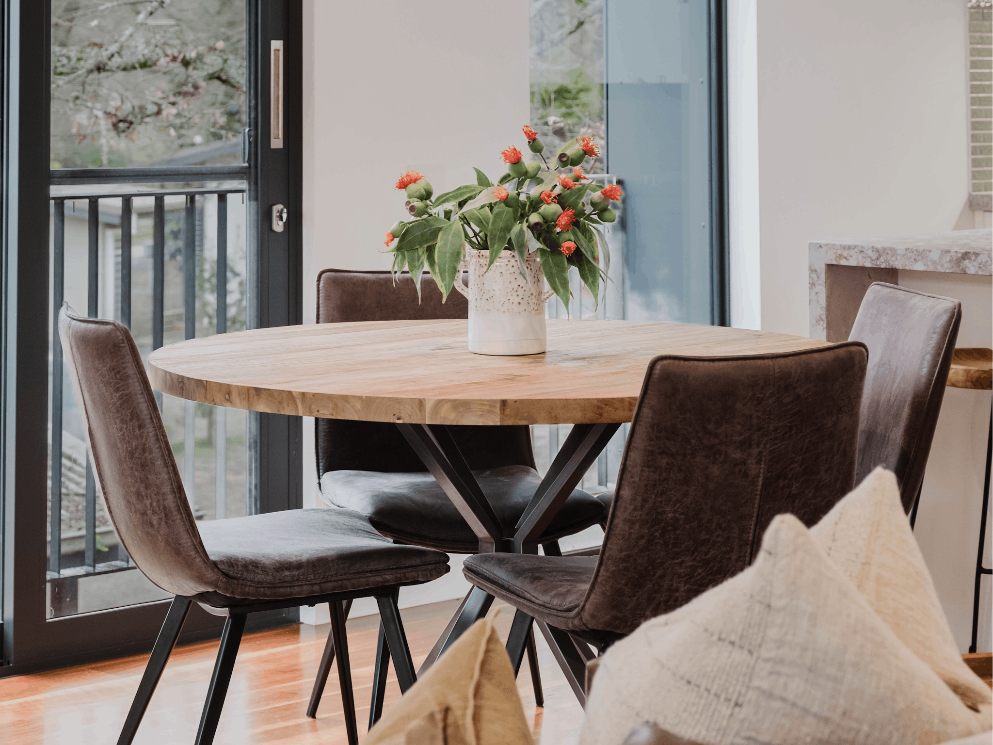 Reed arthouse townhouse dining area with dining table and four chairs