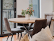 Reed arthouse townhouse dining area with dining table and four chairs