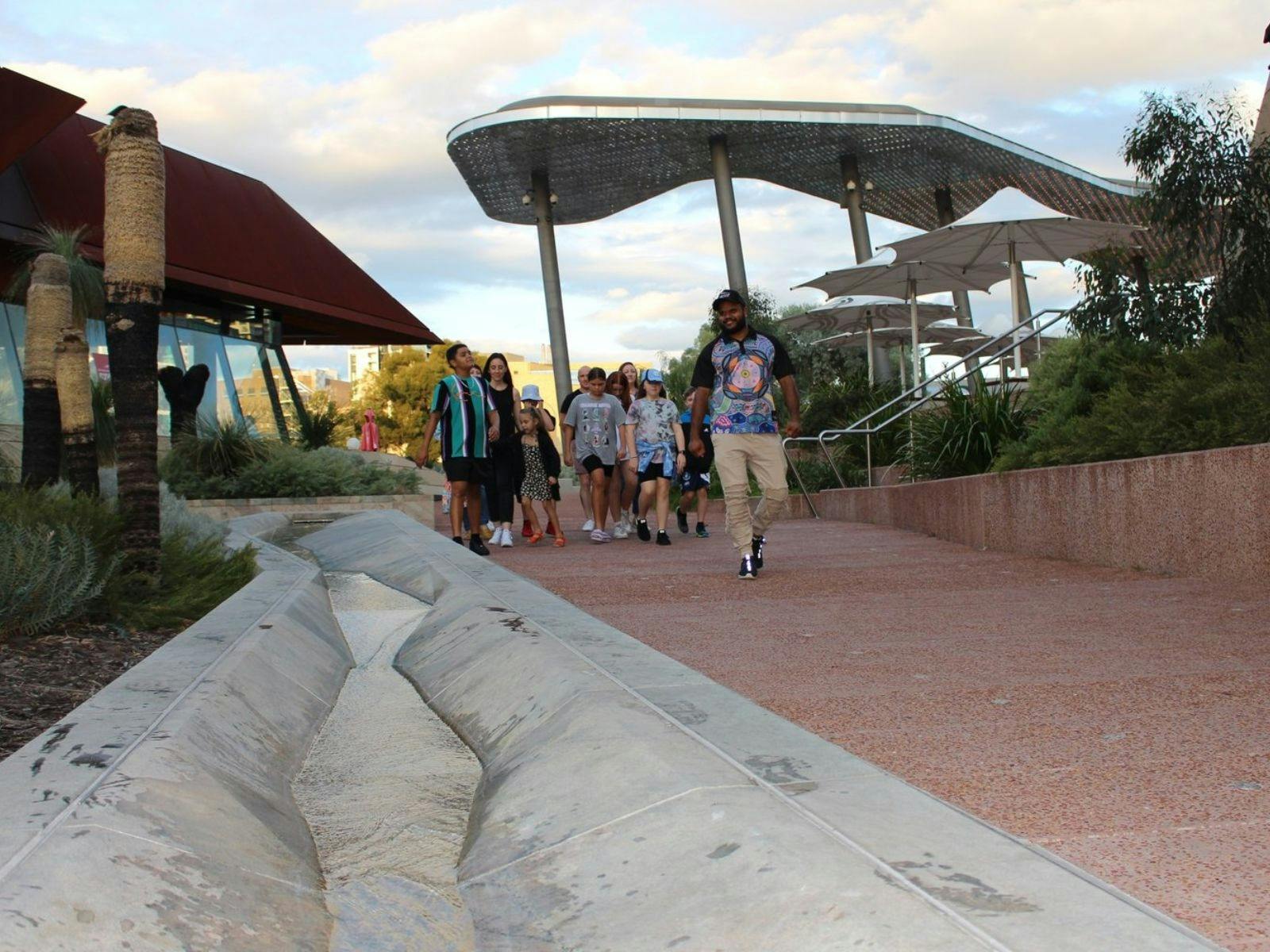 Justin walking through Yagan Square.