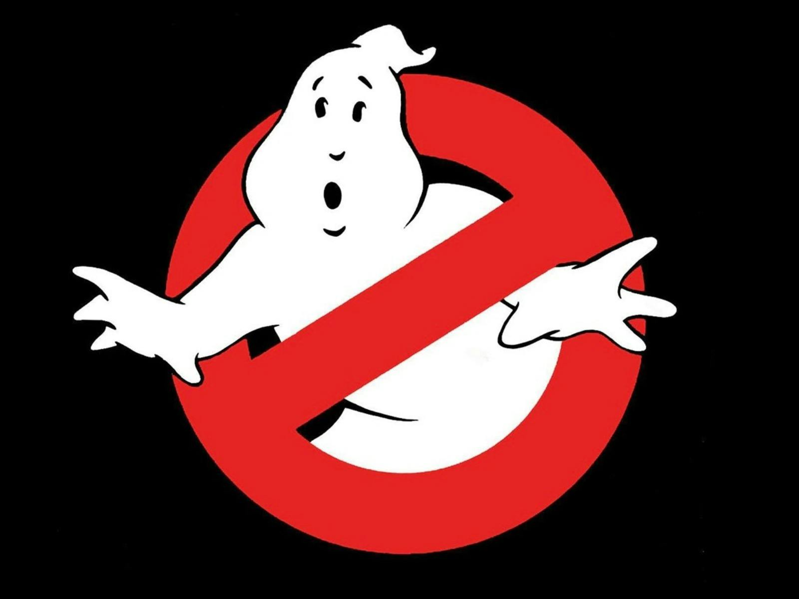 An animated ghost with a red cross through it looks at the camera in front of a black background