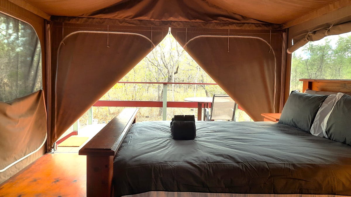 inside view of tent, luxurious bed