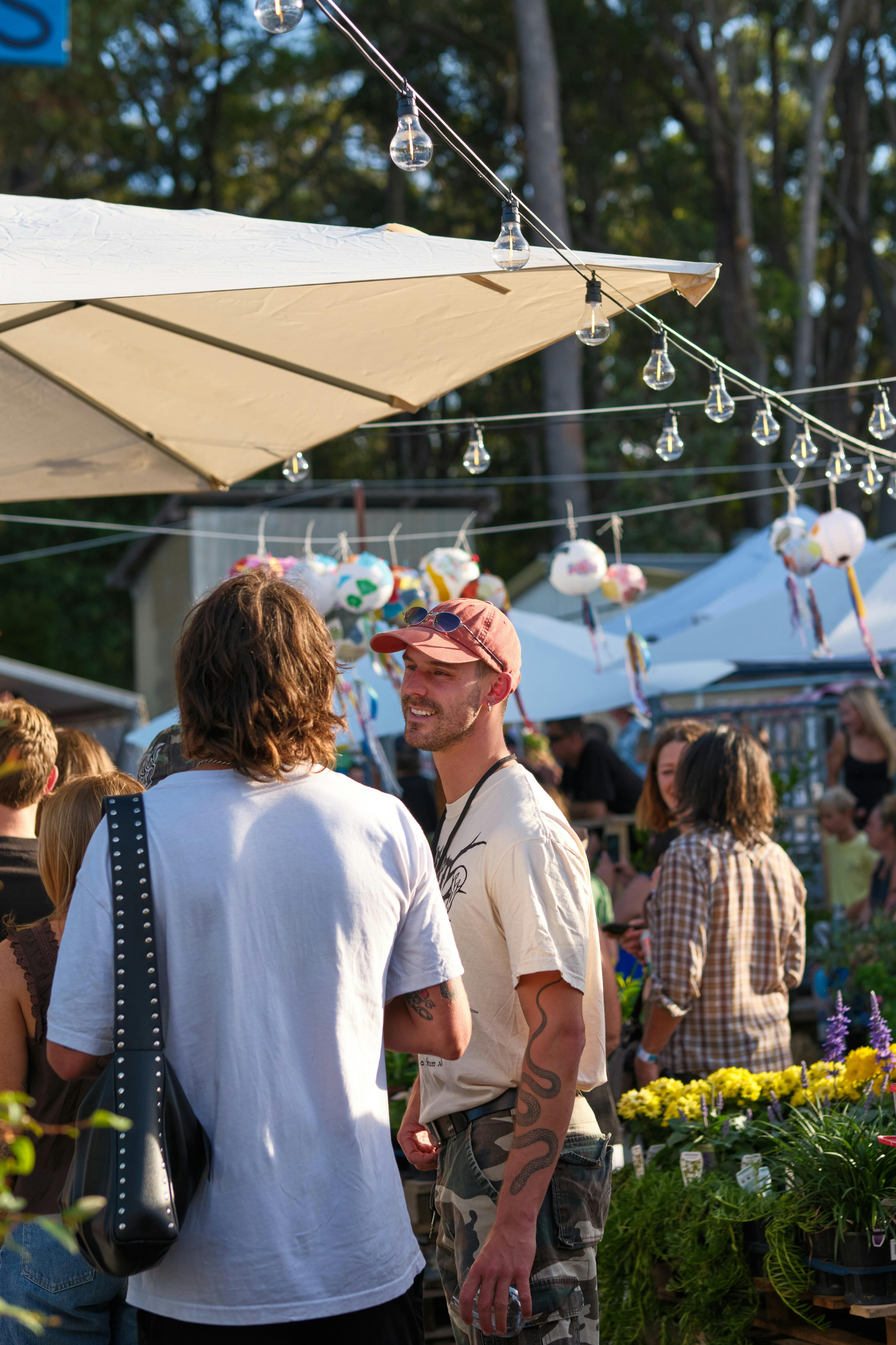 people at the festival in conversation