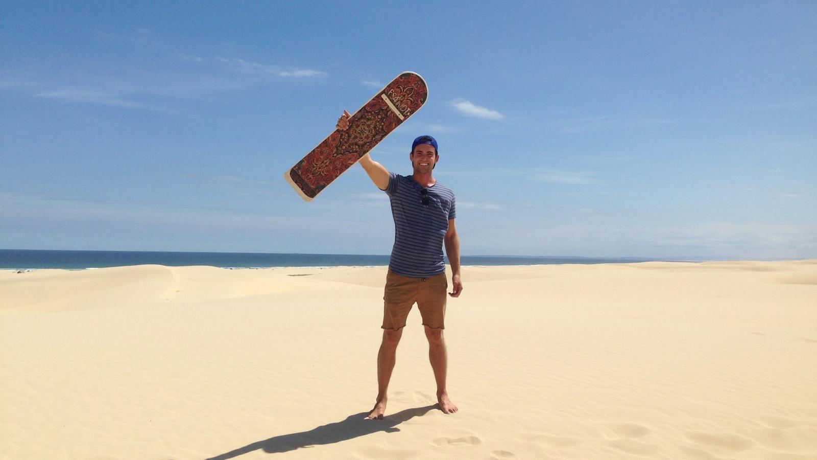 Sandboarder at Birubi Point