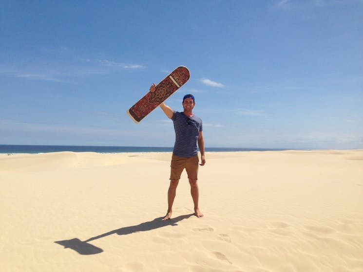 Sandboarder at Birubi Point