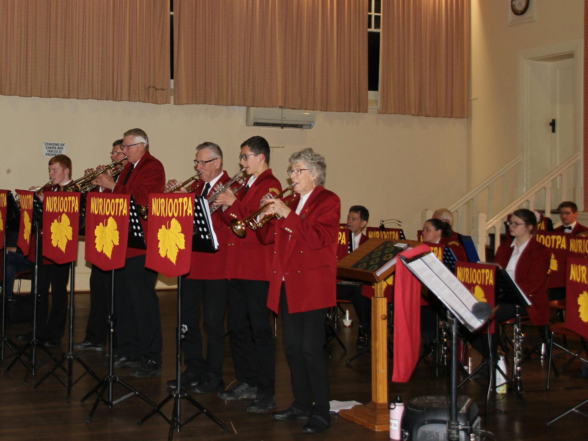 Six trumpet players