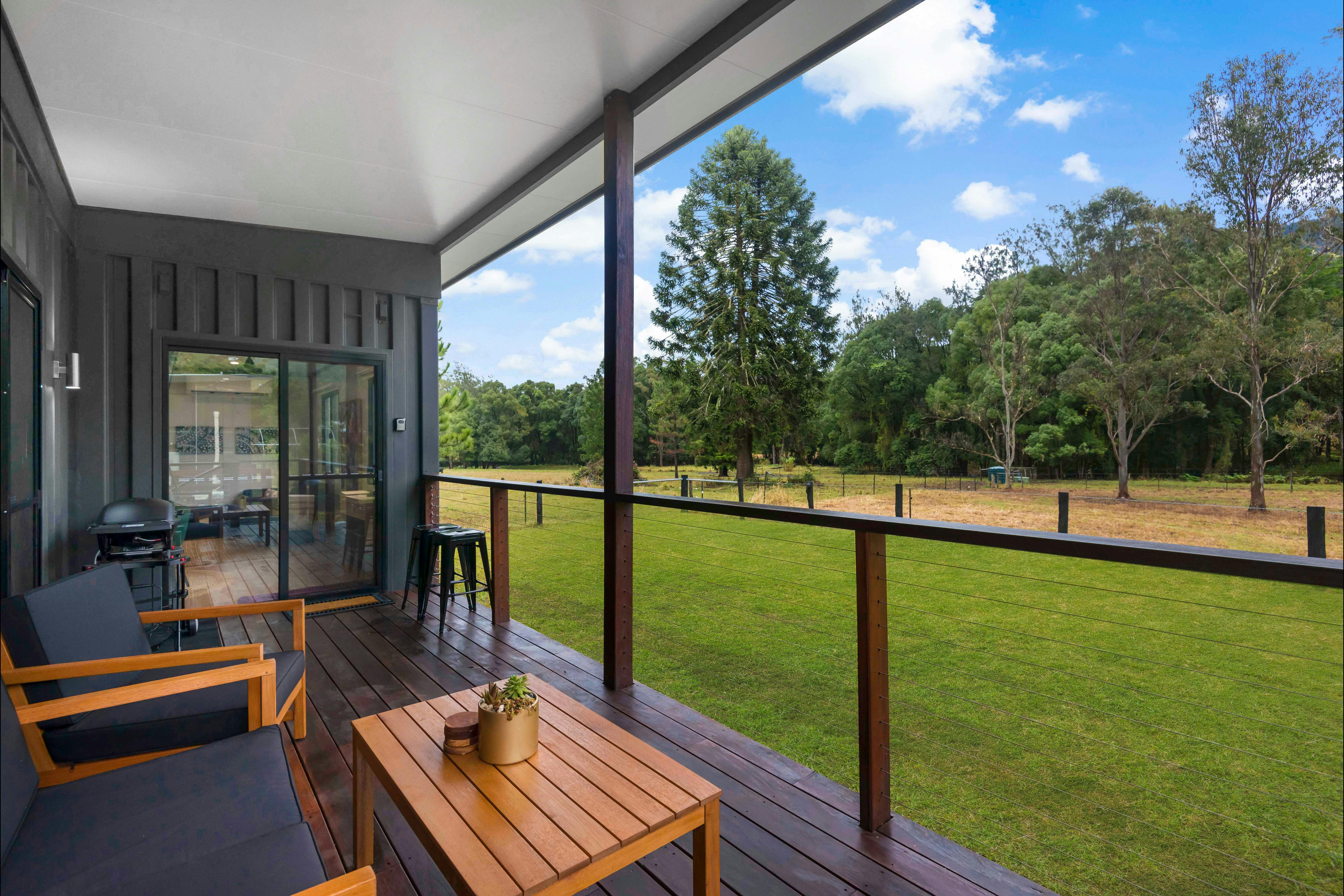 View from the hardwood deck overlooking the farm, cows and serenity