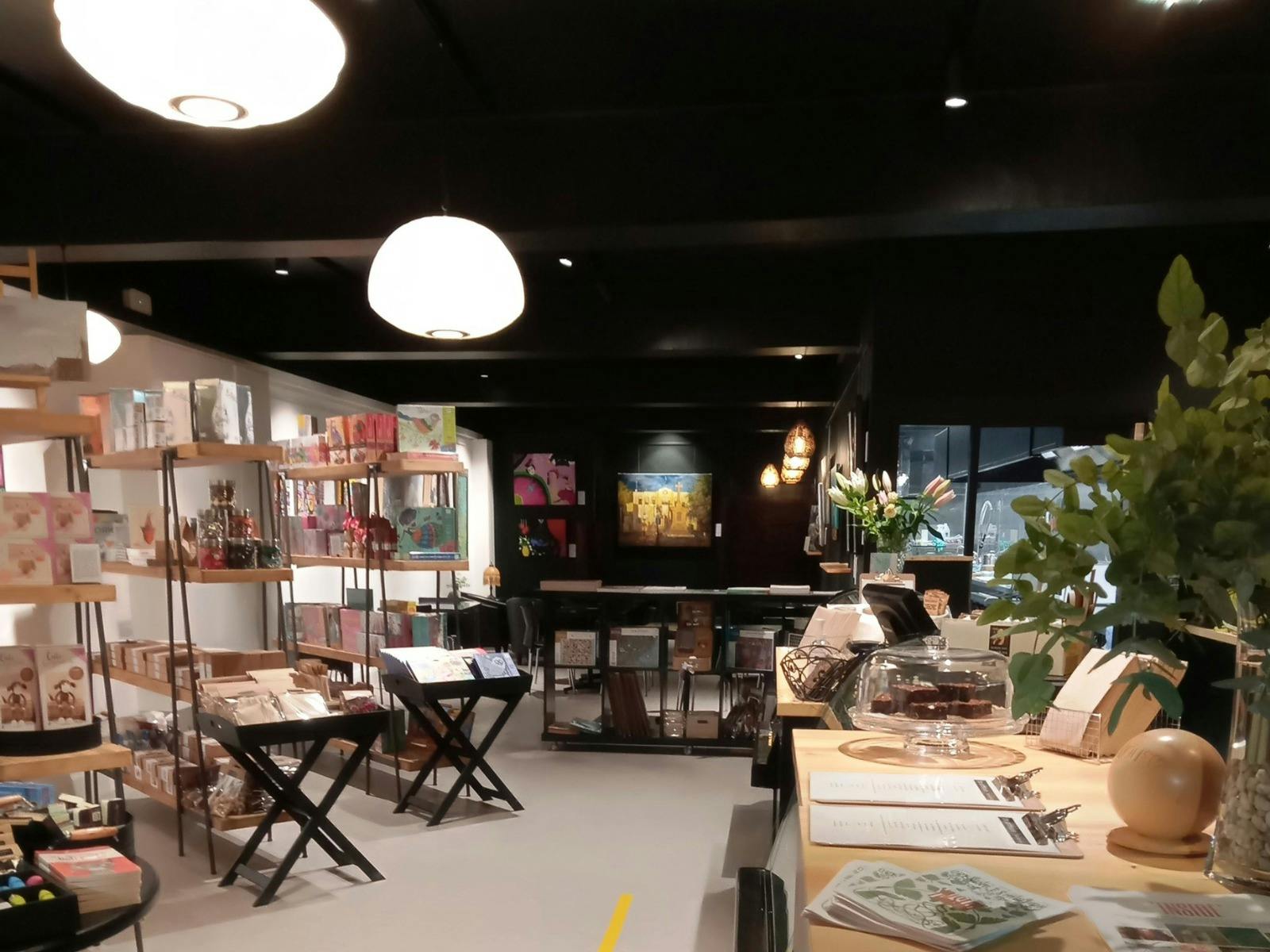 inside the artHouse you will find on the left shelves of creative products of many colours.