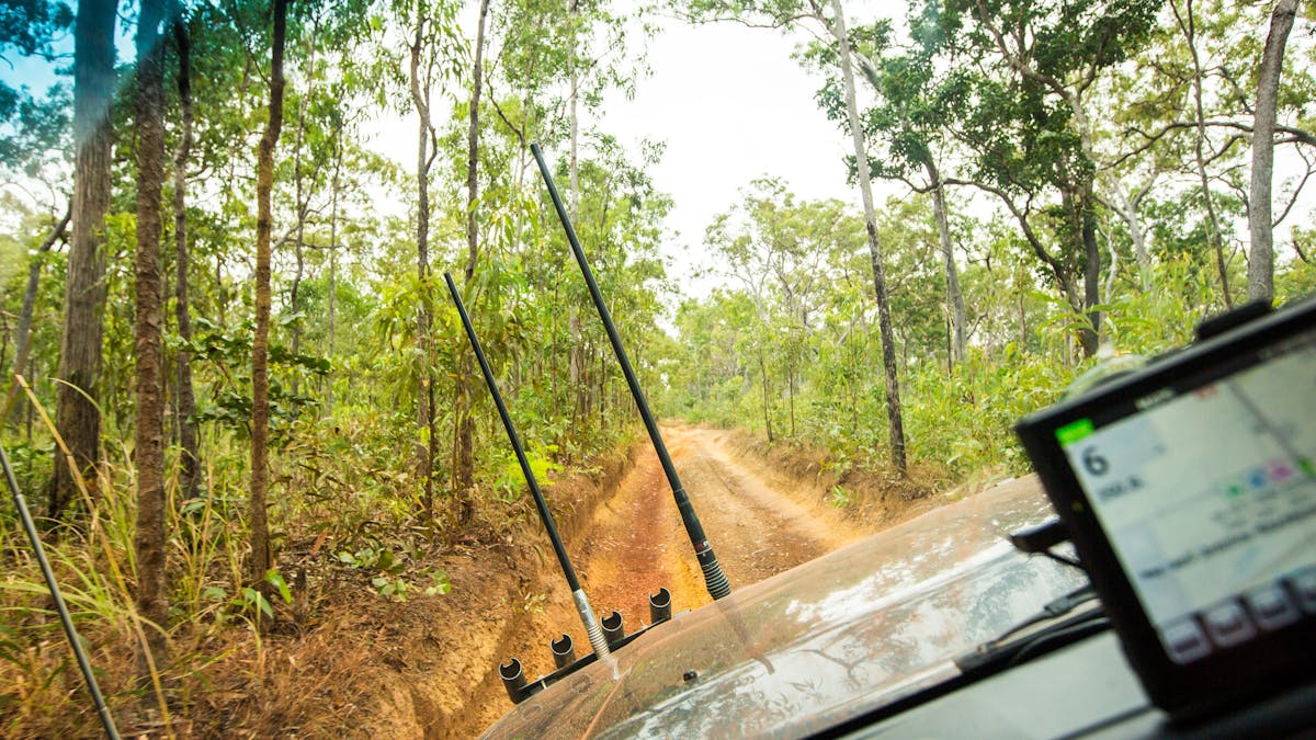 View from passenger seat of a 4WD car driving an offroad dirt track with a steep sideway angle!