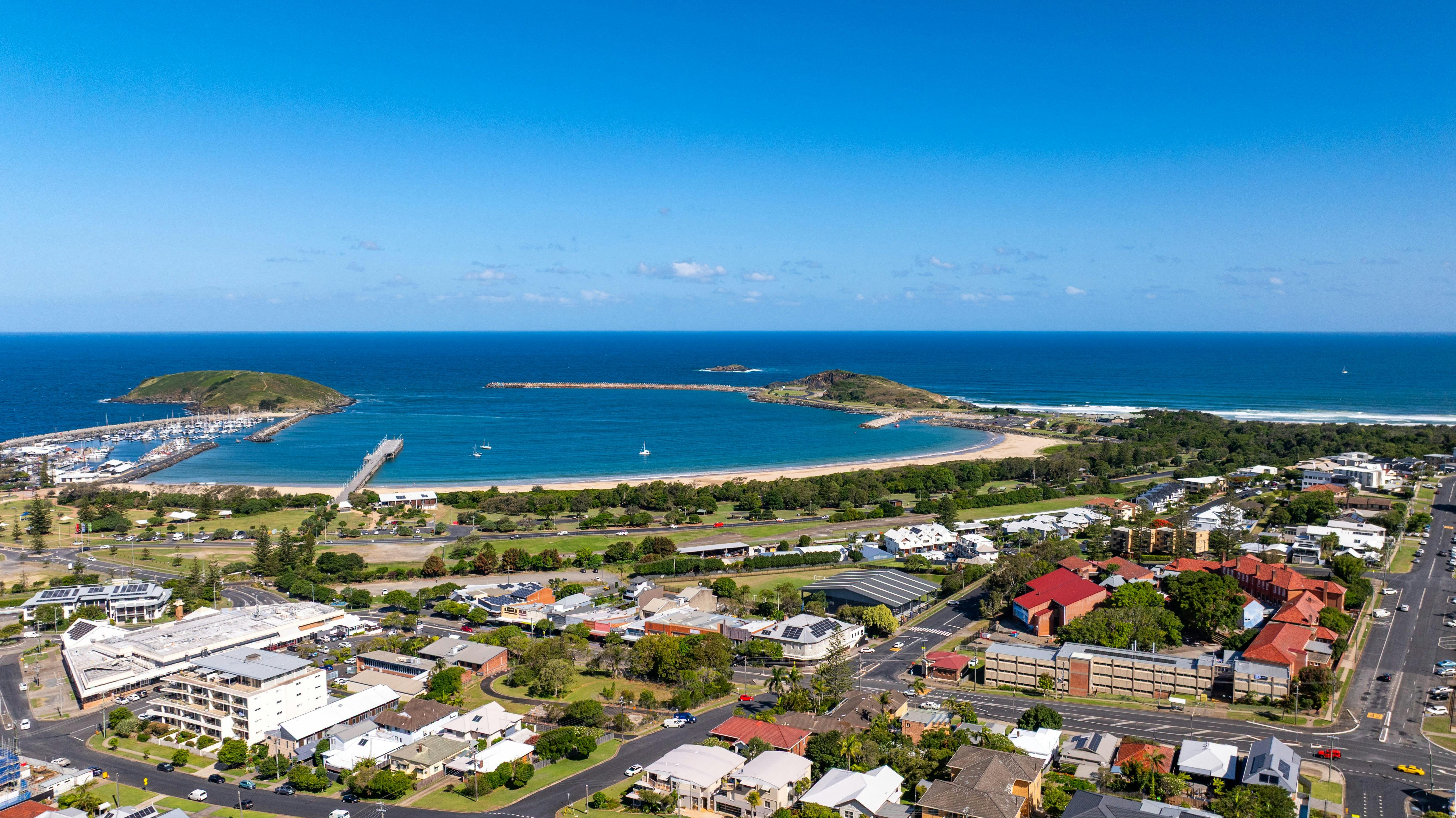 Drone view with house and pool visible right side