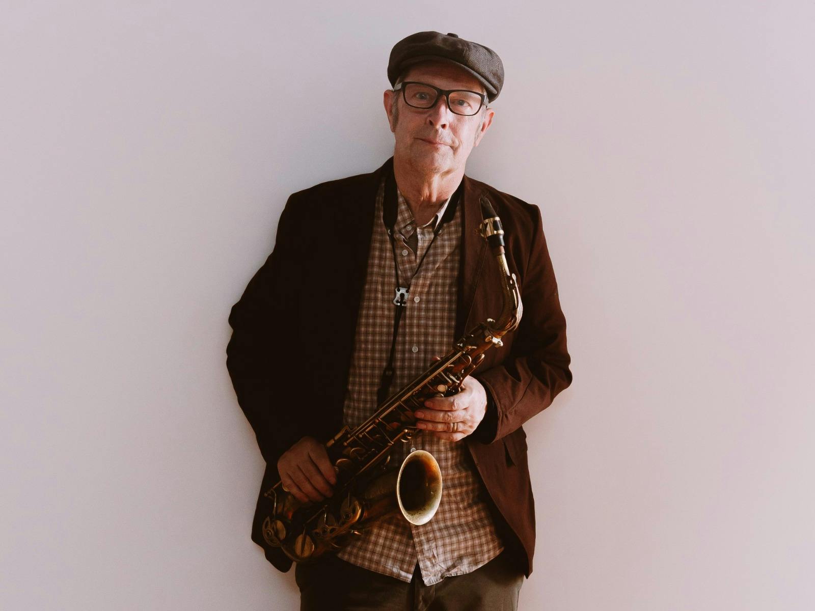 Pictured is Phillip Johnston with his saxophone
