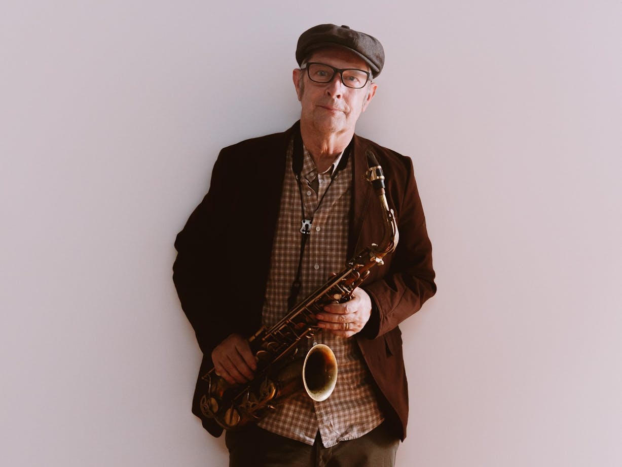 Pictured is Phillip Johnston with his saxophone