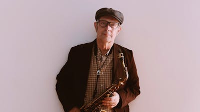 Pictured is Phillip Johnston with his saxophone