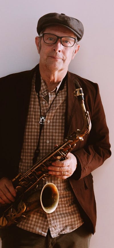 Pictured is Phillip Johnston with his saxophone