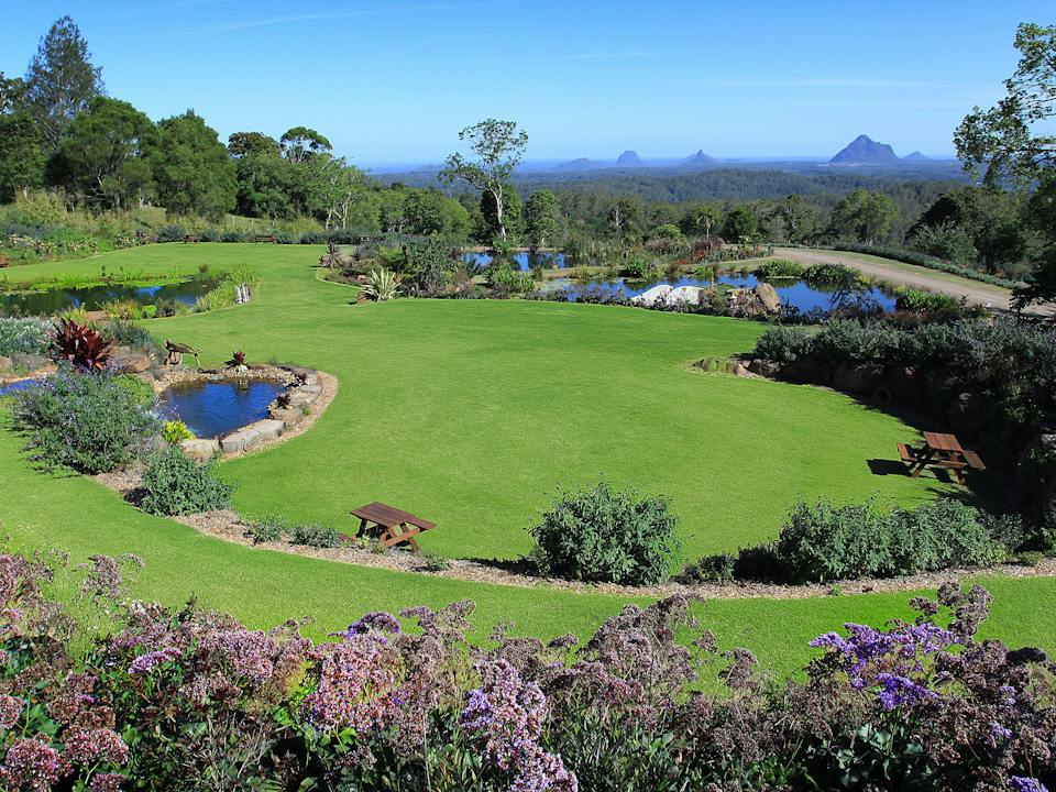 Waterfalls, ponds and stunning Glasshouse Mountain views create an awesome experience