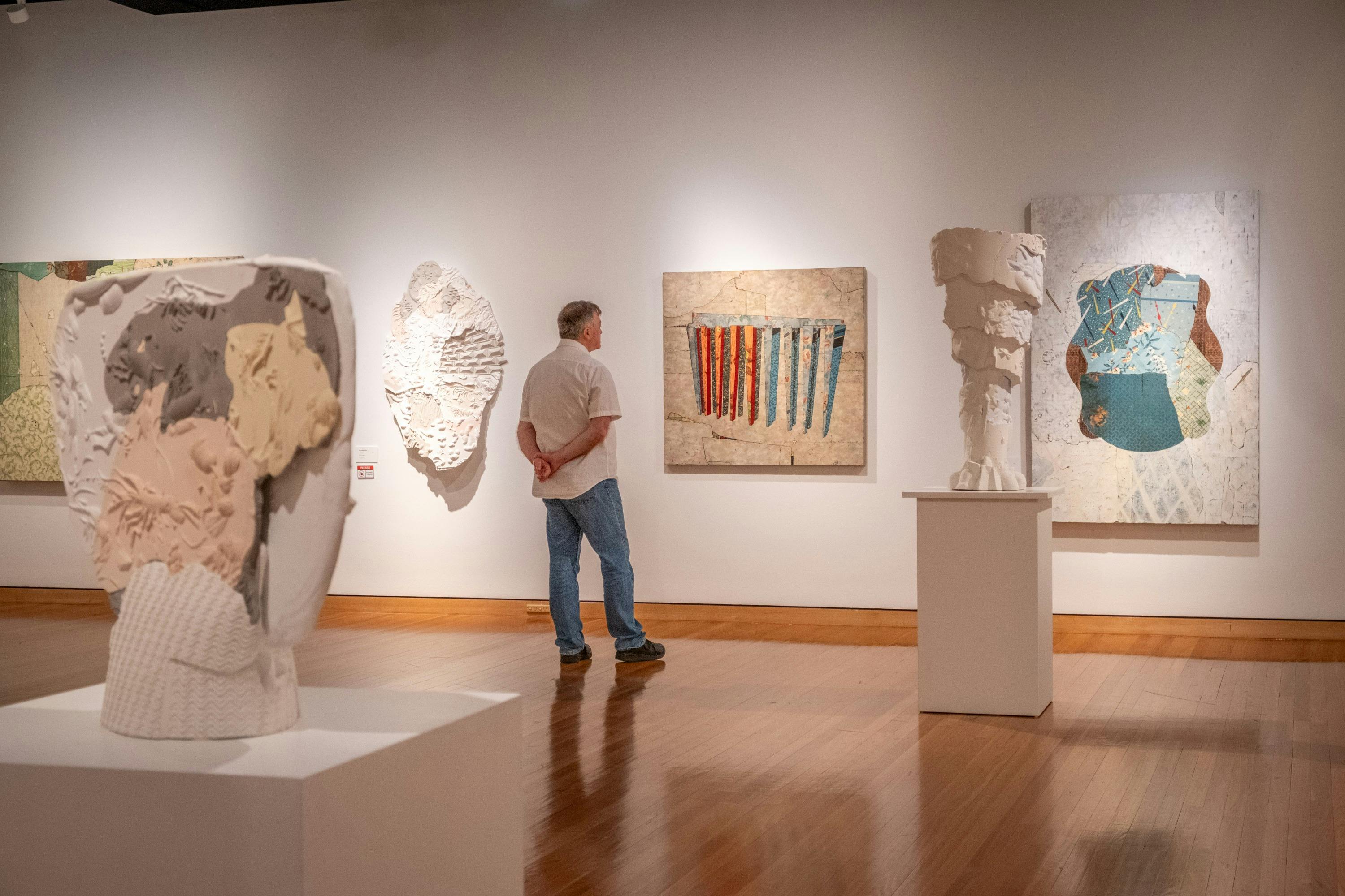 A man observing the work of Bruce Reynolds in How Soon Is Now?