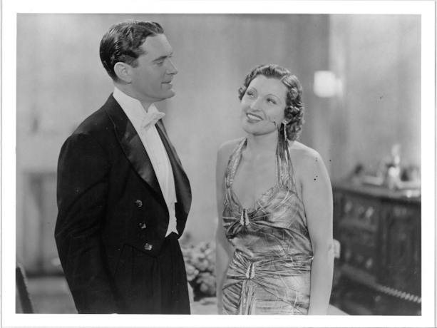 Black and white image of vintage dressed man and woman